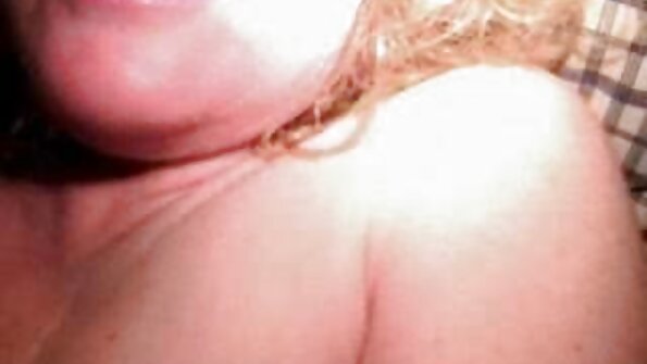 A girl with nipple piercings is giving a blow job to her lover